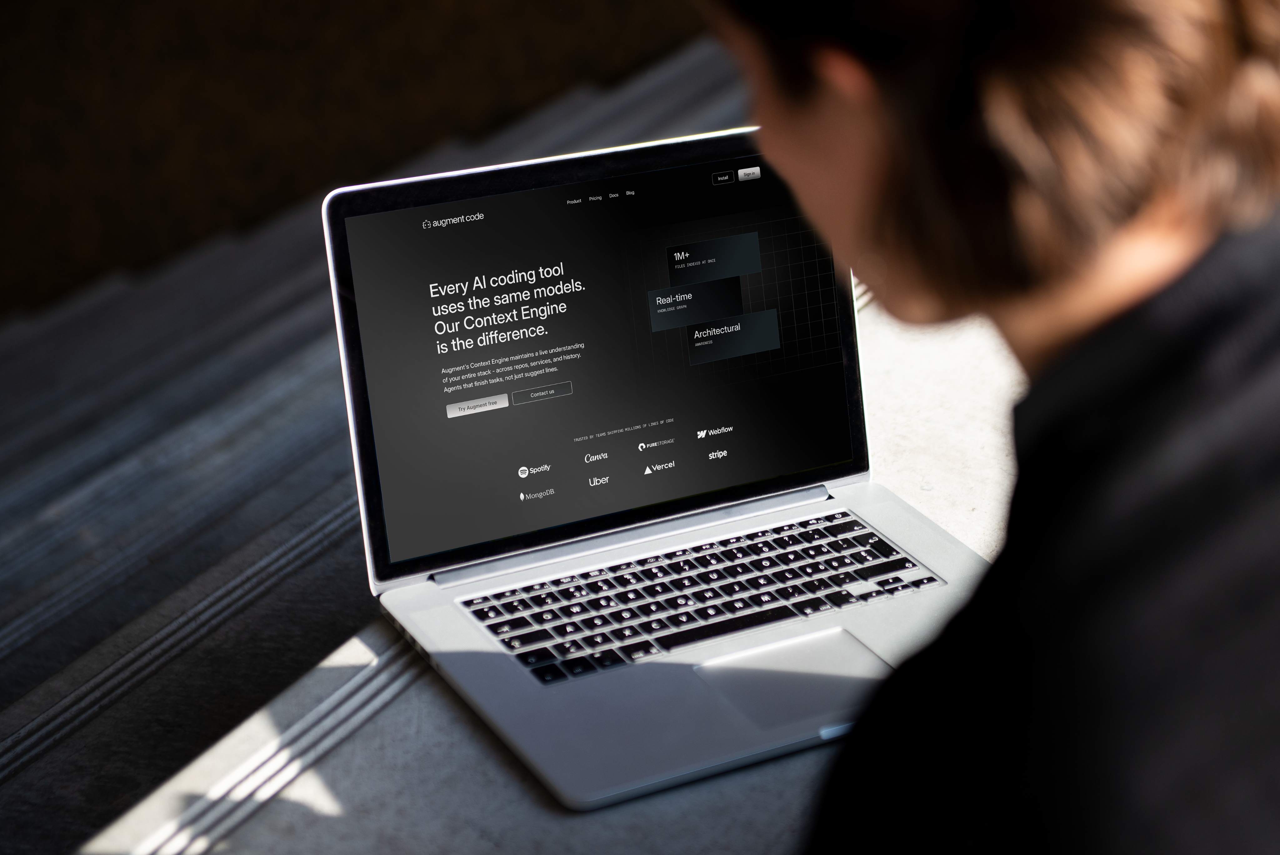 Stationery design of letterhead and business cards for the company Anders on top of a blurred photo of a house interior.